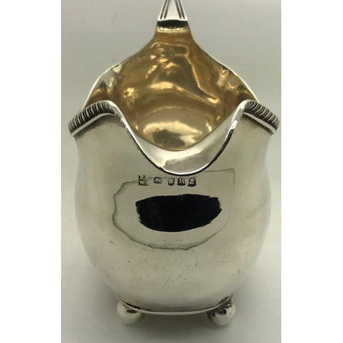 474 - George III silver cream jug, London 1812, maker Peter and William Bateman. 164.9gms with gadroon bor... 