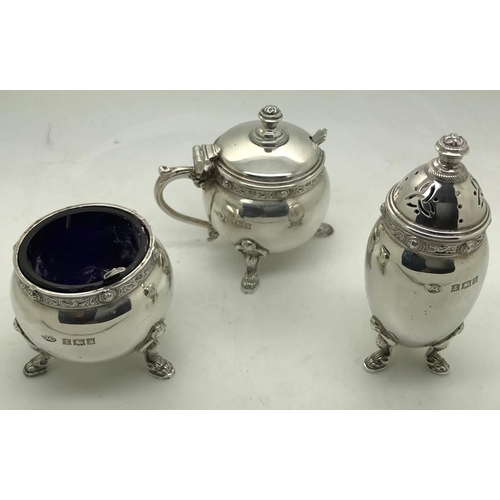 479 - A 3 piece silver cruet with spoons, Birmingham 1954, maker Adie Brothers Ltd. 157.7gms.