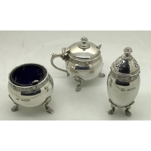 479 - A 3 piece silver cruet with spoons, Birmingham 1954, maker Adie Brothers Ltd. 157.7gms.