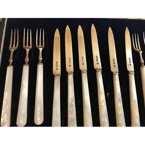 484 - An 18 place setting, silver and mother of pearl fruit knives, maker William Hutton and Sons Ltd.