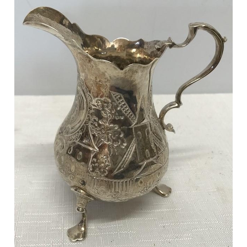 491 - Hallmarked silver jug, 11cms h, embossed decoration with windmill, maker E.C possibly Ebenezer Coker... 