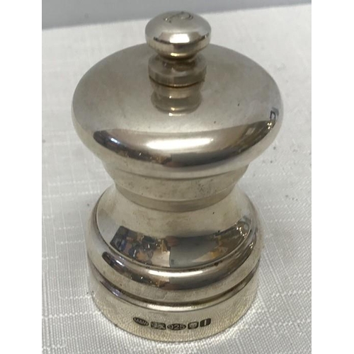 492 - Hallmarked silver pepper grinder Mappin and Webb, London, stamped 925. Cole and Mason inner metal gr... 