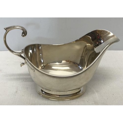 503 - Hallmarked silver sauce boat, Mappin and Webb, Birmingham 1934. 107gm. 9cms h.