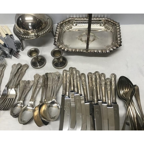 508 - Selection of silver plate, Kings pattern cutlery, folding handle dish, dwarf candlesticks and a muff... 