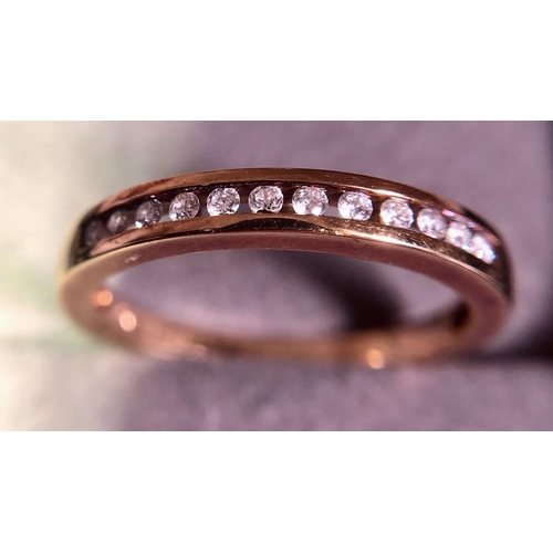 527 - A 9ct gold ring set with diamonds. 2.2gms, size O.