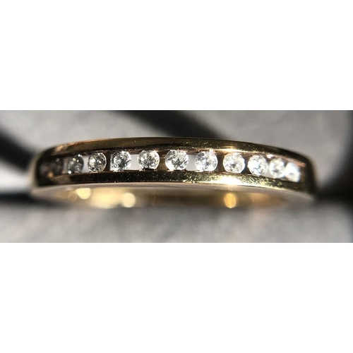 527 - A 9ct gold ring set with diamonds. 2.2gms, size O.