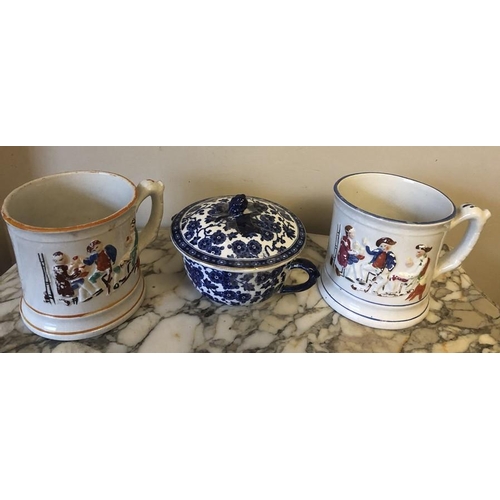 53 - Two large 19thC mugs depicting tavern scenes with frogs to interior, losses to paint and both with h... 