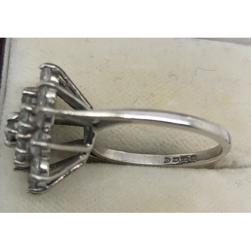 538 - Ladies dress ring CZ set in 18ct white gold. Size L. 5.1gms.