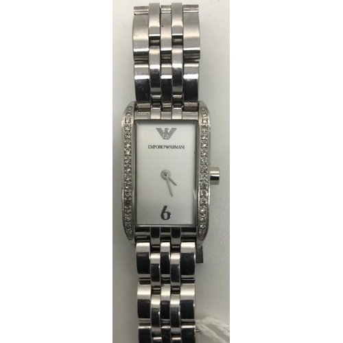 543 - A lady's stainless steel and diamond set Emporio Armani Quartz wrist watch.