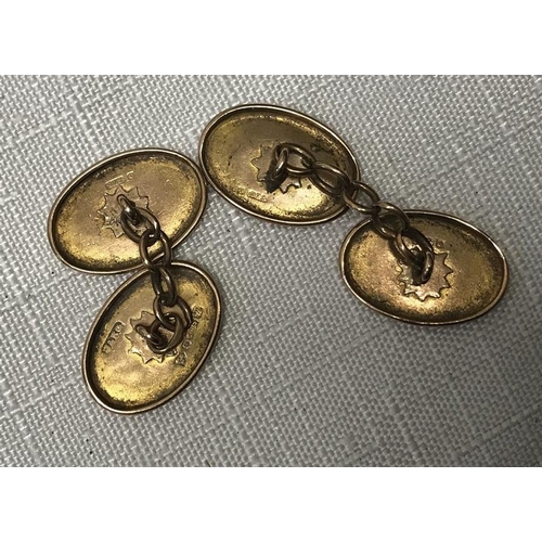 548 - Pair of 9ct gold oval cufflinks, leaf engraved design, 16mm w, 3.5gms.