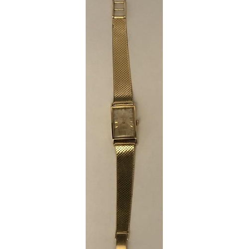 550 - A ladies Omega Ladymatic 18 carat gold wrist watch, total weight 38.9gms.