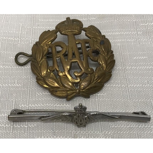 555 - RAF cap badge with back pin and a RAF bar brooch. 6cms w.