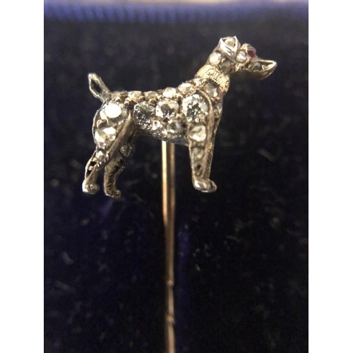 556 - A white and yellow metal dog tie pin set with diamonds in original fitted case. JW Benson Ltd, 25 Ol... 