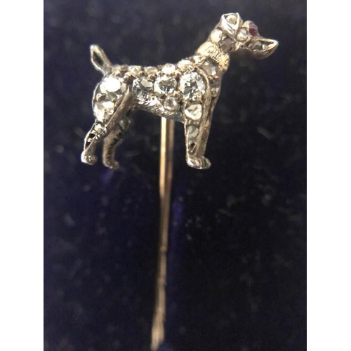 556 - A white and yellow metal dog tie pin set with diamonds in original fitted case. JW Benson Ltd, 25 Ol... 