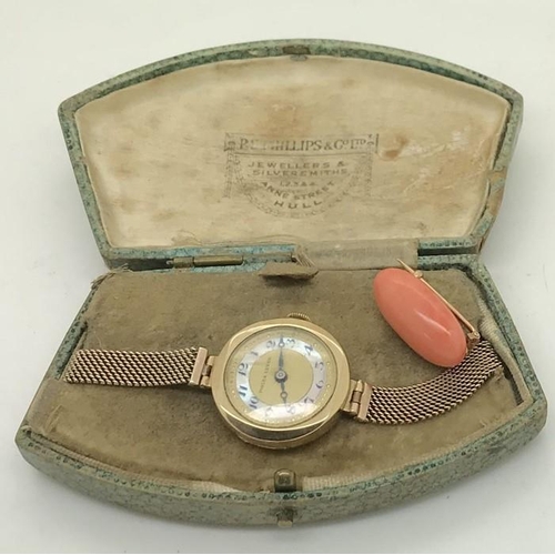 558 - A 9ct gold cased Philex Lever ladies wristwatch with 9ct gold strap total weight 20.3 gms. And a cor... 