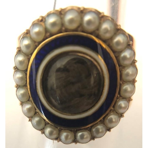 562 - A 19thC mourning ring, hair locket to centre with blue and white enamel surrounded by natural pearl ... 