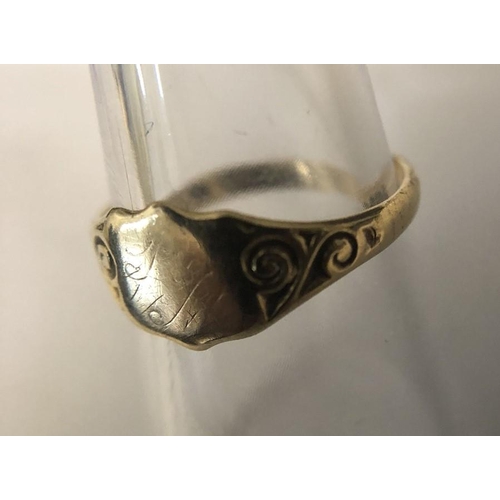 564 - A 9ct yellow gold signet ring, size M, 1.3gms, shield shaped.