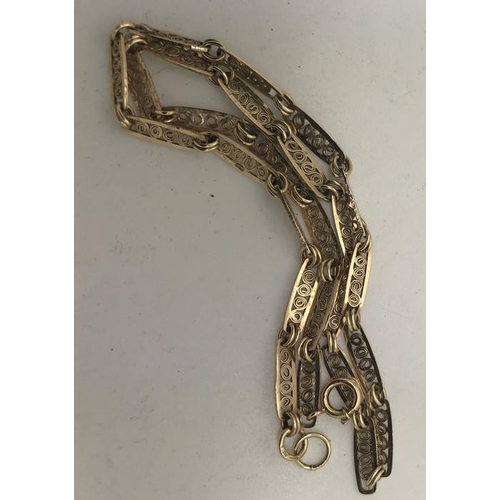 573 - A 9ct yellow gold fancy link chain. 7.4gms, 39cms l.