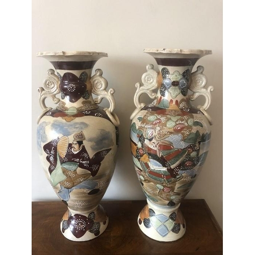 58 - Japanese earthenware vases. 57cms h.