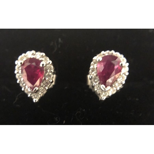 582 - Ruby and diamond pear shaped cluster earrings in 18ct white gold, 2.3gms.