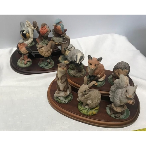 63 - Royal Doulton, A Langford British Wild Birds and animals collection, three sets of six figures with ... 