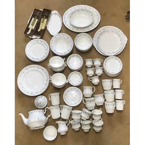 64 - Royal Albert Memory Lane blue floral pattern tea and dinner ware, 86 pieces.