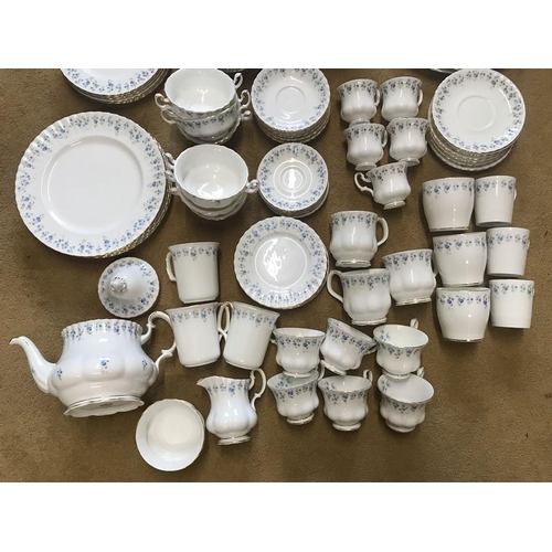 64 - Royal Albert Memory Lane blue floral pattern tea and dinner ware, 86 pieces.