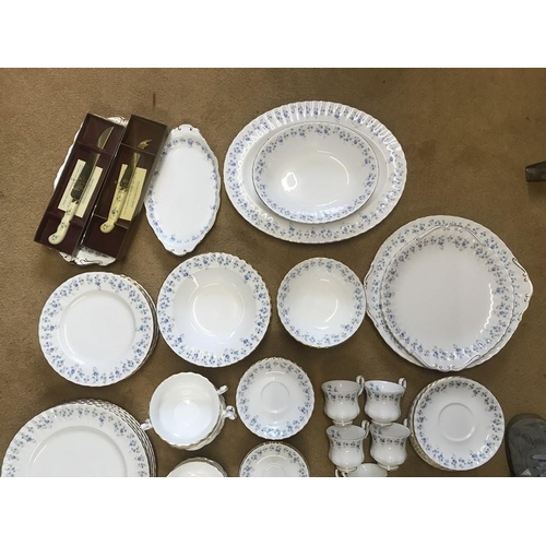 64 - Royal Albert Memory Lane blue floral pattern tea and dinner ware, 86 pieces.