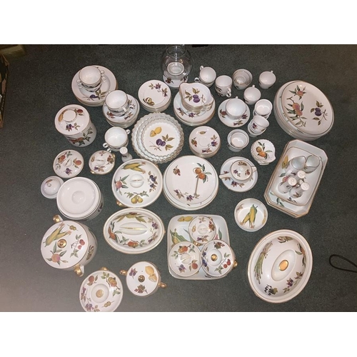 73 - A large quantity of Royal Worcester Evesham pattern dinner and tea ware to include 4 bowls, 4 plates... 