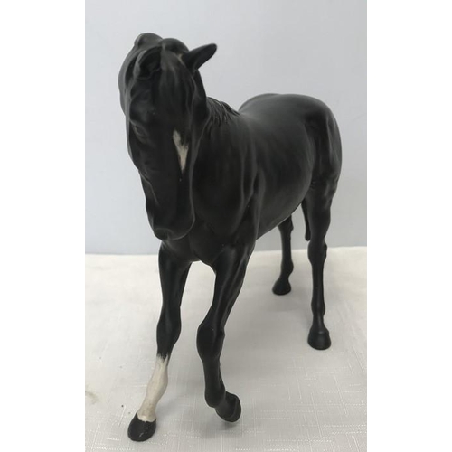 83 - Beswick black horse, matt finish. 18 h x 25cms w.