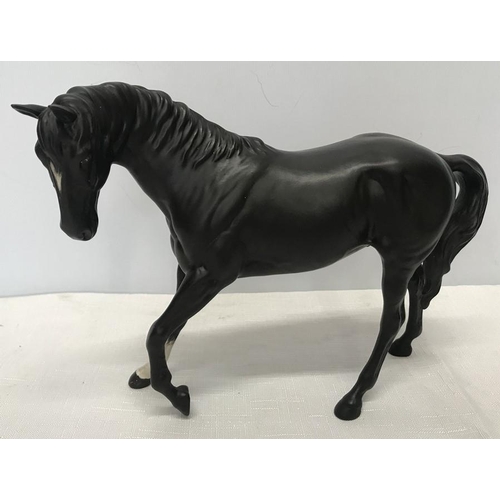 83 - Beswick black horse, matt finish. 18 h x 25cms w.