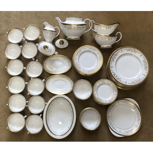 93 - Royal Doulton Belmont H4991 dinner and tea ware, 68 pieces with gilt decoration.