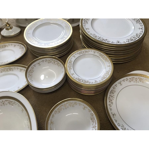 93 - Royal Doulton Belmont H4991 dinner and tea ware, 68 pieces with gilt decoration.