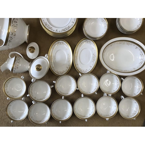 93 - Royal Doulton Belmont H4991 dinner and tea ware, 68 pieces with gilt decoration.