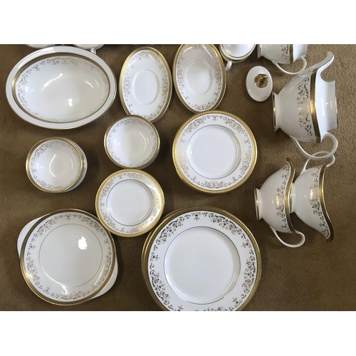 93 - Royal Doulton Belmont H4991 dinner and tea ware, 68 pieces with gilt decoration.