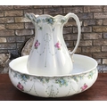 A Victorian wash jug and bowl with forget me nots and roses, Royal Staffordshire pottery, Wilkinson ... 