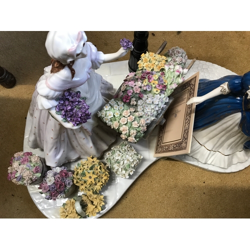 A large group figurine The Flower Seller by Coalport, limited