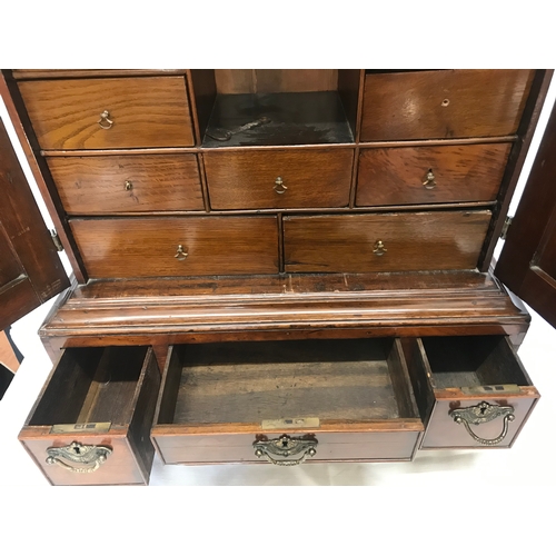 1426 - Queen Anne circa 1710 spice cupboard. Virginian walnut and multi-drawered oak interior. 77cm h x 61c... 