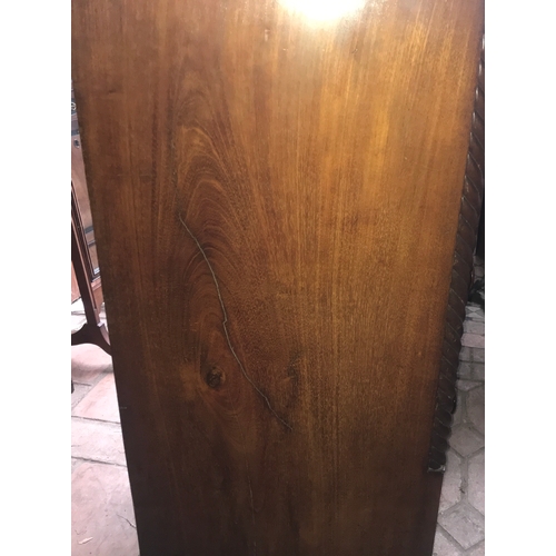 1409 - A 19thC mahogany bowfront chest of drawers, wooden knobs inset with mother of pearl.