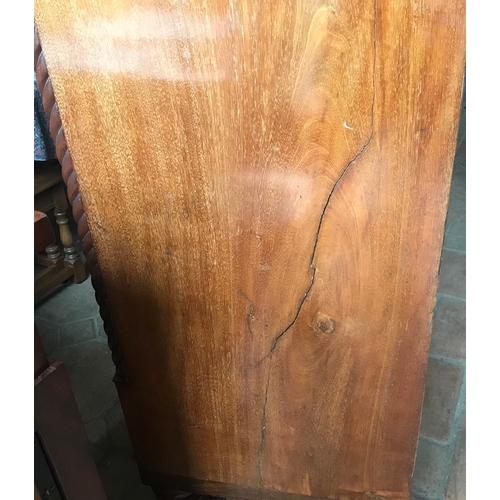 1409 - A 19thC mahogany bowfront chest of drawers, wooden knobs inset with mother of pearl.