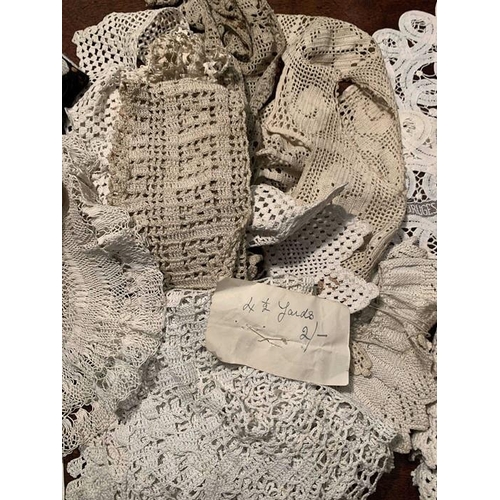 100 - Mainly white linen and crochet edgings with embroidered and silk braid and crochet edged table cloth... 