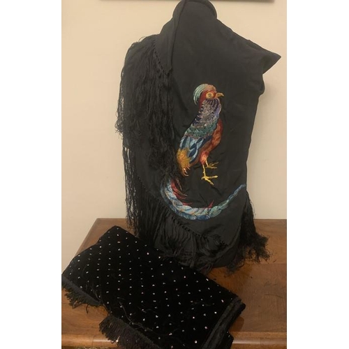 103 - Black shawl with tassels and embroidered oriental pheasant, 95cms square approx with velvet and sequ... 