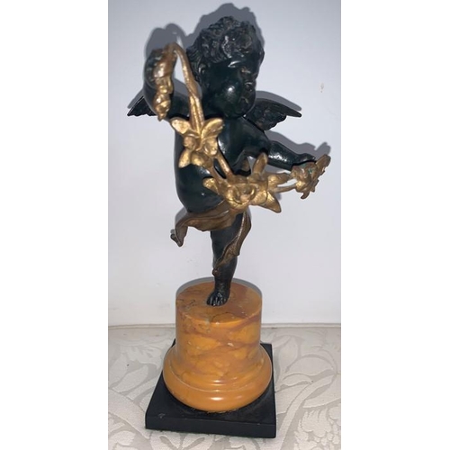 1160 - Bronze winged putto standing on one leg holding garland of flowers, slate base with Sienna marble pl... 