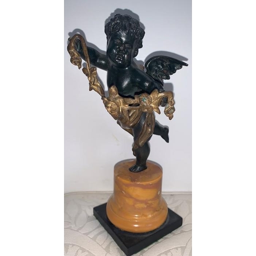 1160 - Bronze winged putto standing on one leg holding garland of flowers, slate base with Sienna marble pl... 