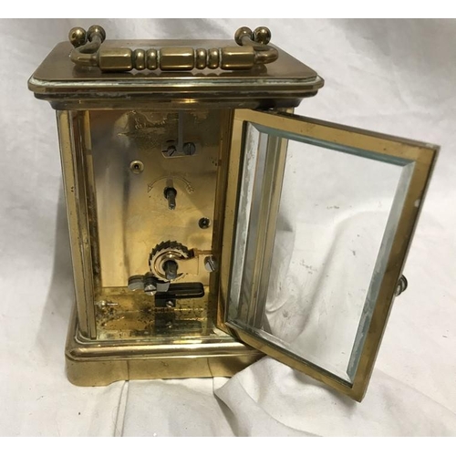 1165 - Brass carriage clock, Matthew Norman London, 11cms h not including handle, 8 w x 7cms d.