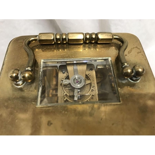 1165 - Brass carriage clock, Matthew Norman London, 11cms h not including handle, 8 w x 7cms d.