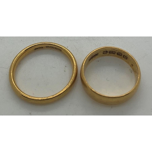 117 - Two 22ct gold wedding bands, 9.2gms total weight, sizes O and L.