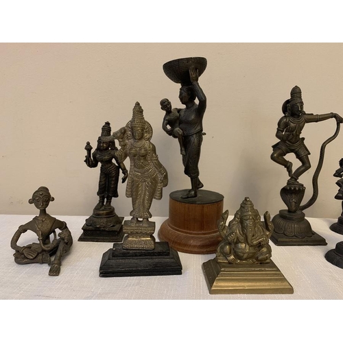 1171 - Ten oriental bronze and brass figures including a set of four.