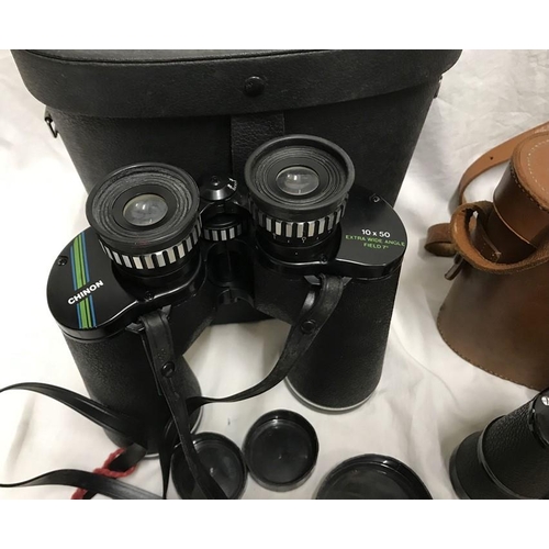 1178 - Two pairs of binoculars, leather cased Kershaw Reliant. 9 x 36 and cased Chinon 10 x 50 binoculars.