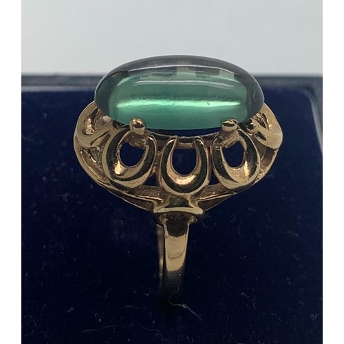 119 - A 9ct gold and tourmaline dress ring, size P, 4.7gms total weight.